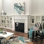 The living room is fully staged with accessories and furnishings.